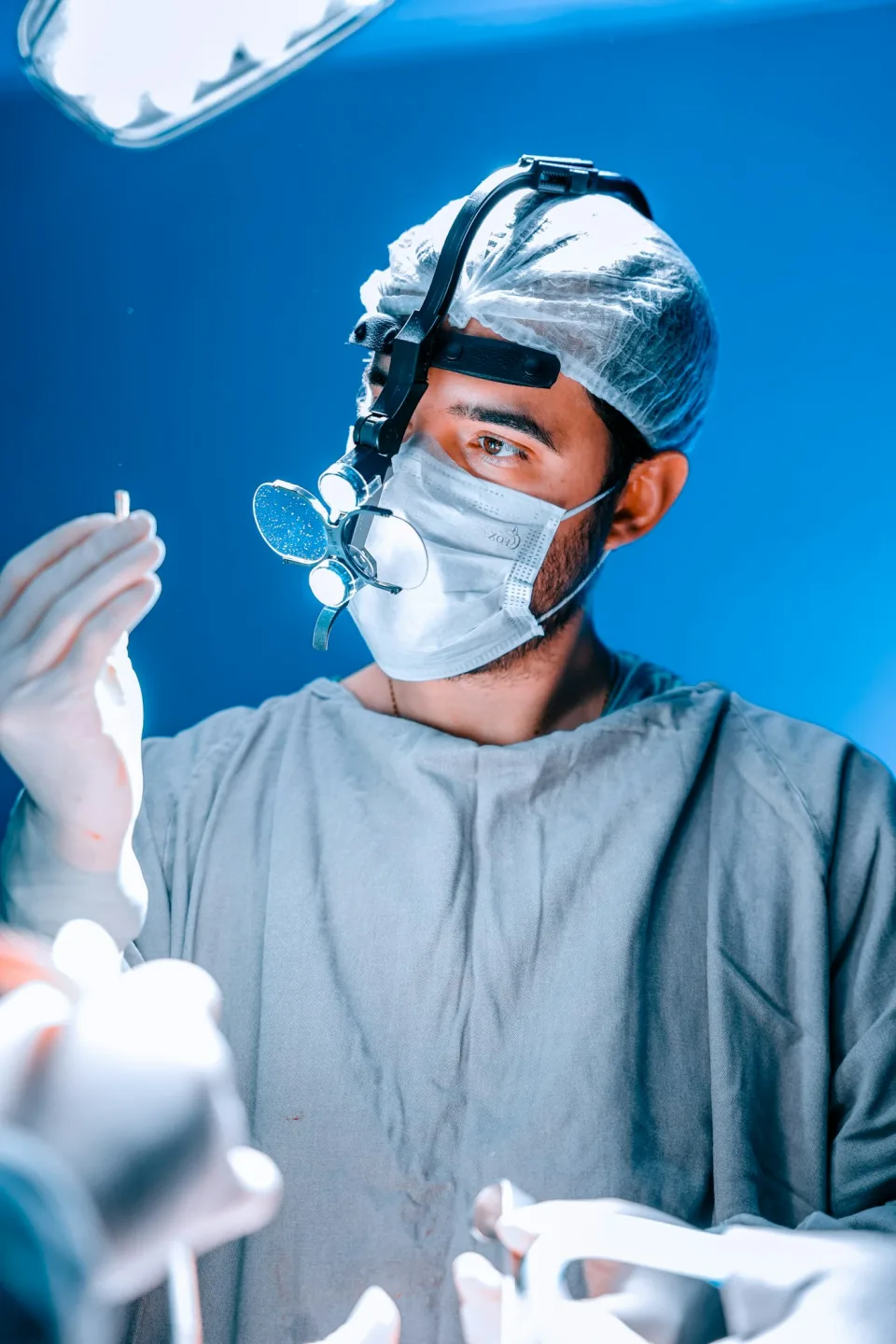 A healthcare professional working with medical equipment; representative stock photo